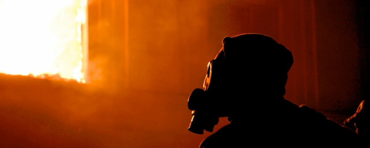 silhouette of man wearing helmet and goggles
