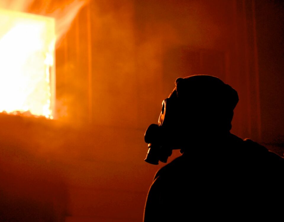 silhouette of man wearing helmet and goggles